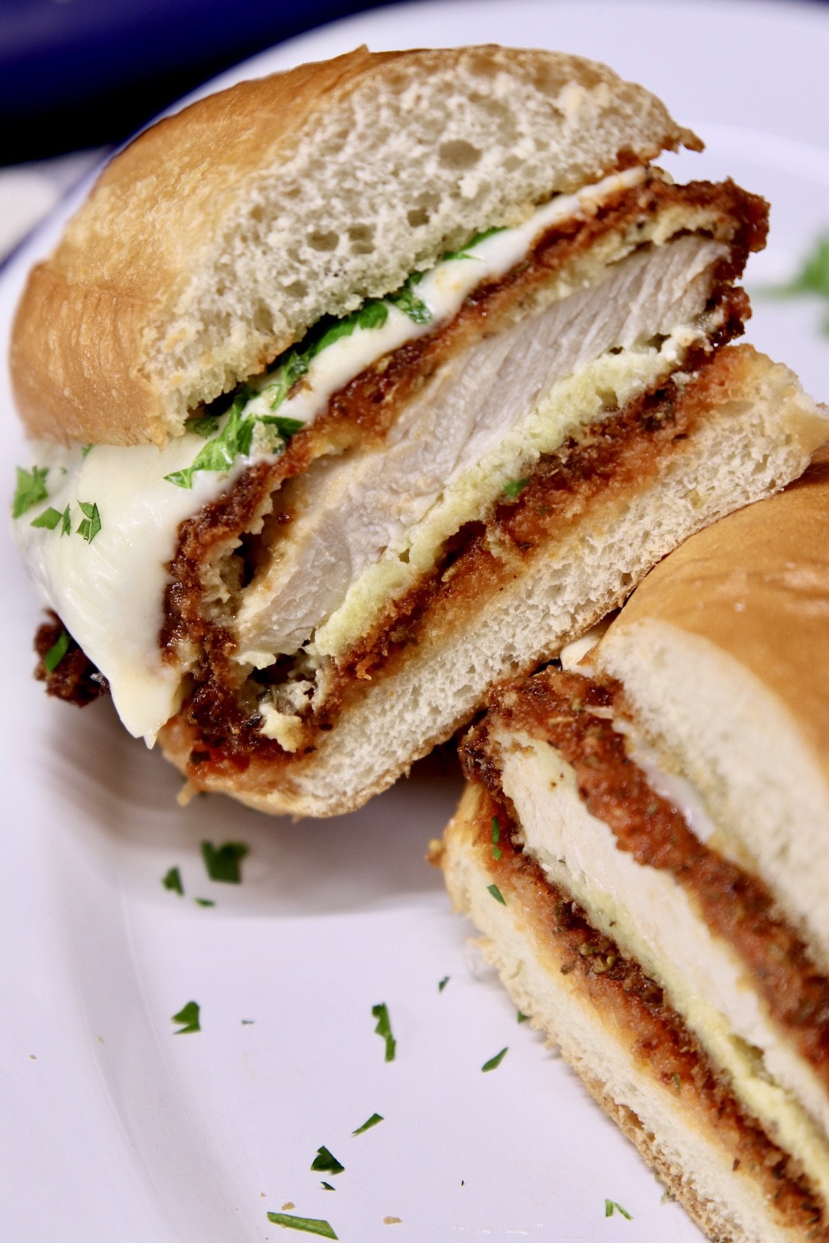 Chicken Parmesan Sandwich cut in half - close up