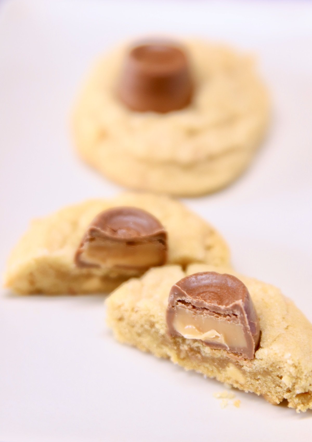 2 peanut butter rolo cookies, one cut in half
