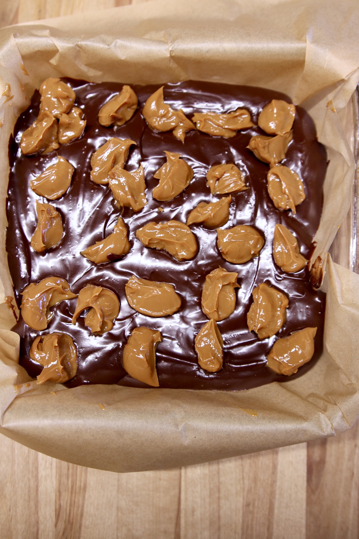 dollops of caramel over chocolate fudge