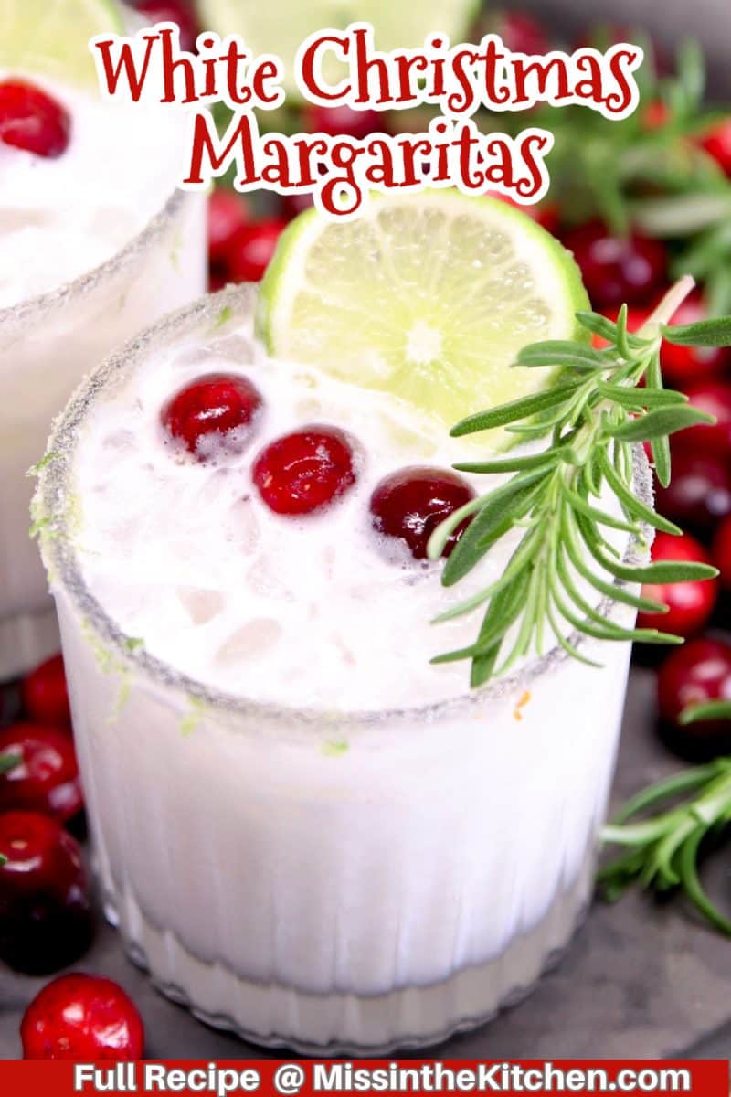 White Christmas margaritas with cranberry garnish.