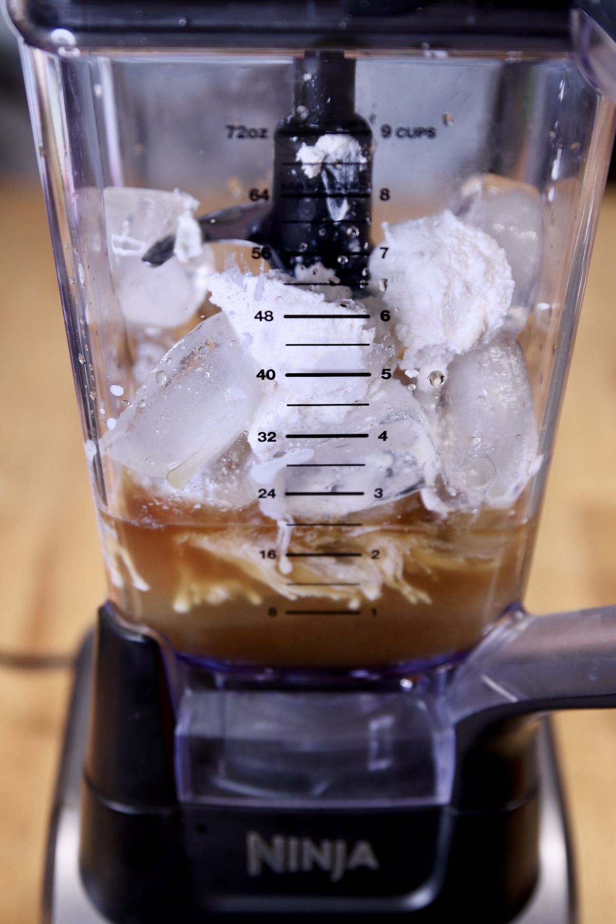 making rocket fuel rum cocktail in a blender with ice