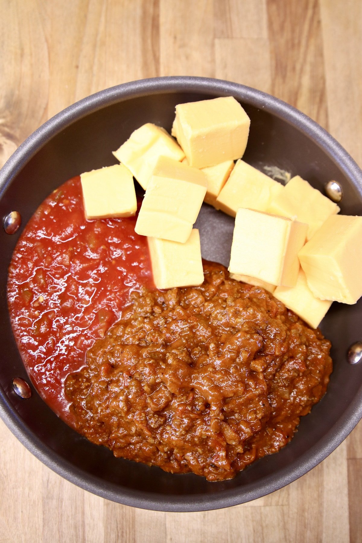 pan with velveeta chunks, chili and picante sauce.