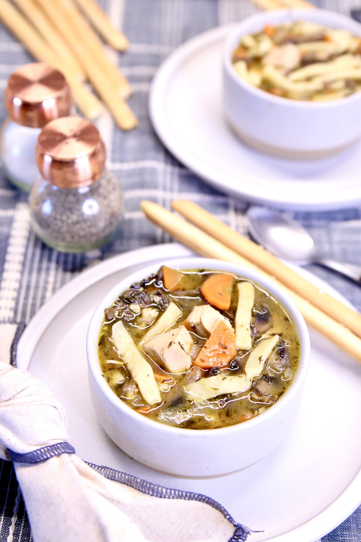 2 bowls of chicken and mushroom soup. 