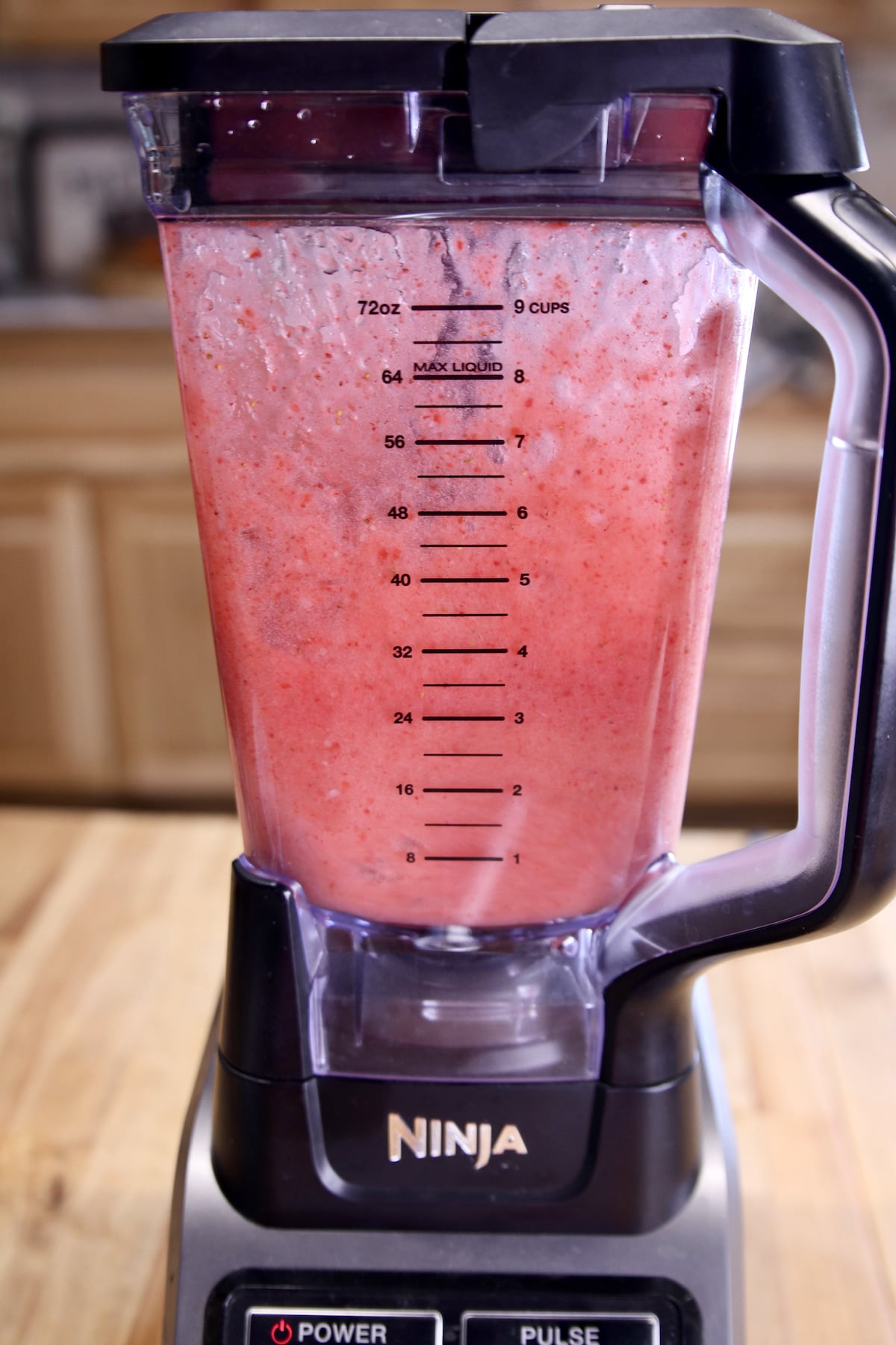 blending strawberry cocktail.