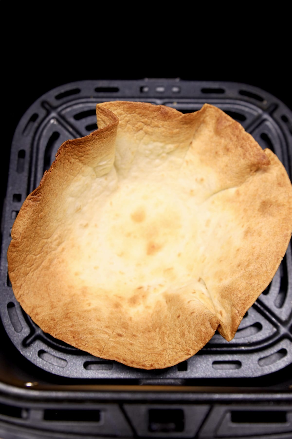 Taco salad bowl in an air fryer.