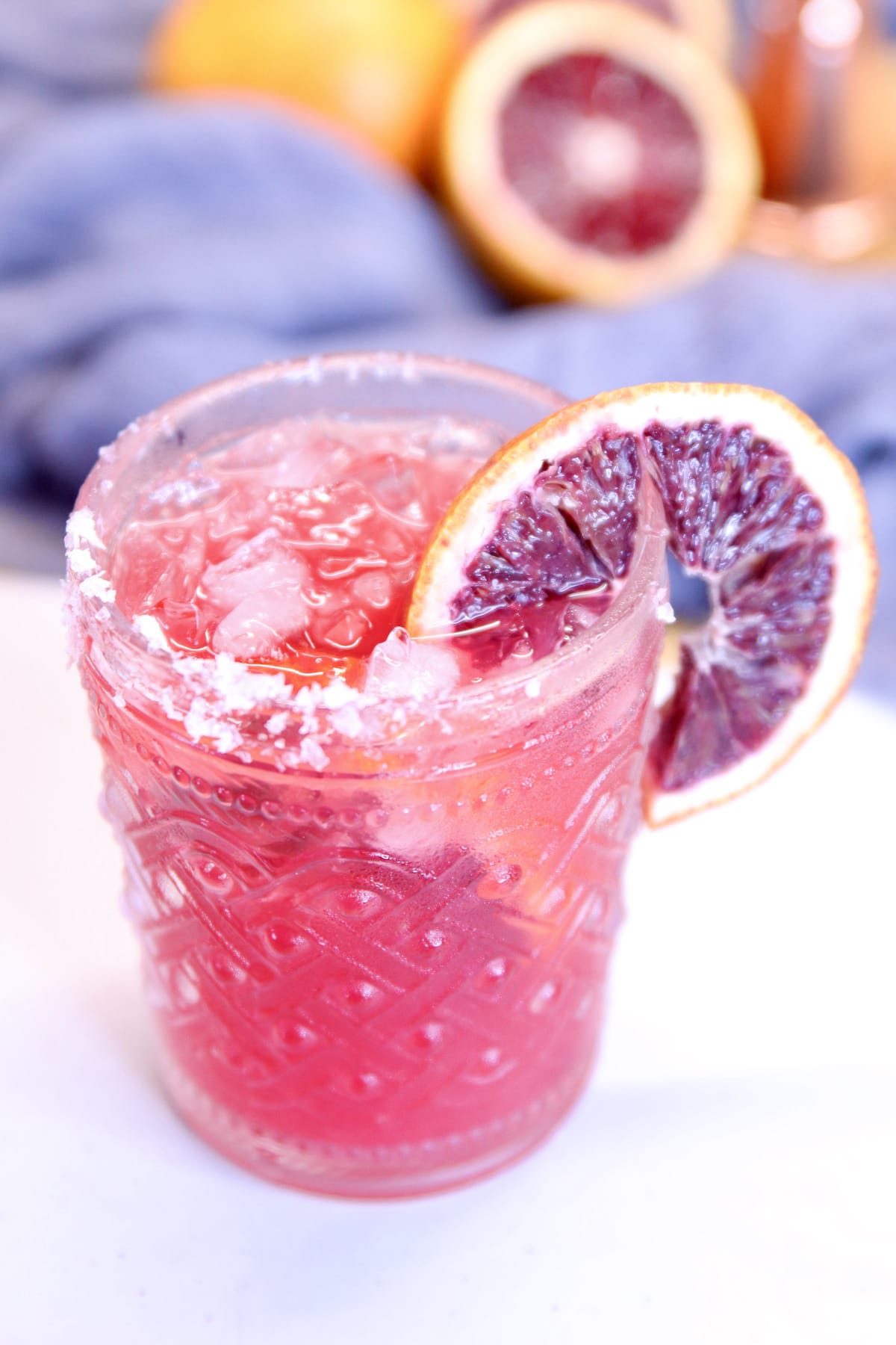 Blood orange margarita with salted rim.