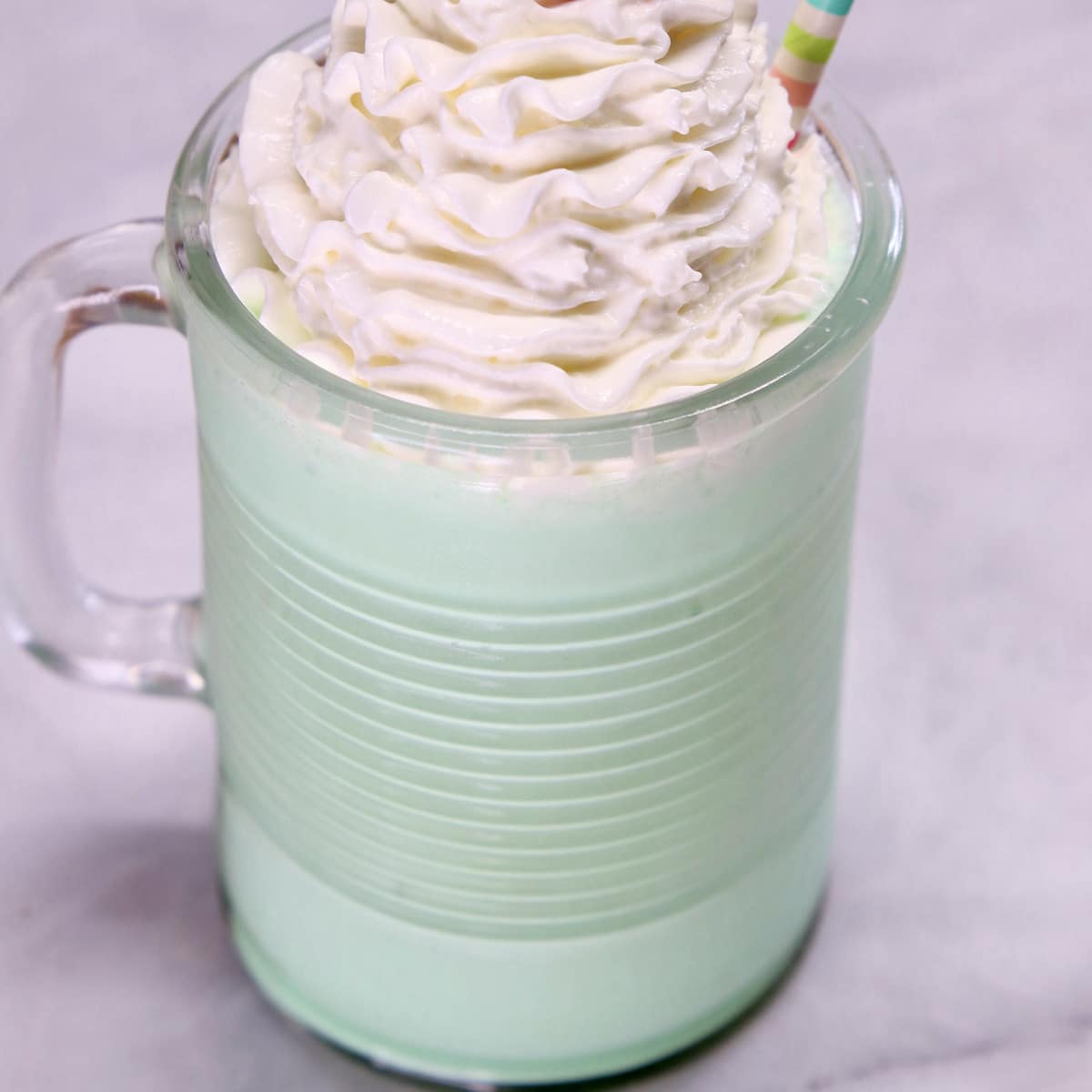 Boozy shamrock shake with whipped cream.