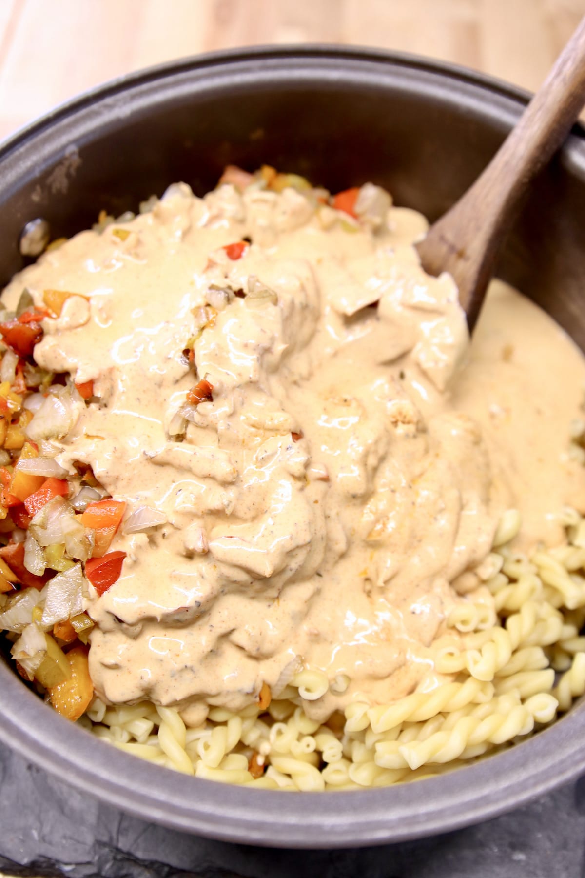Pasta with creamy Cajun sauce in a pan.