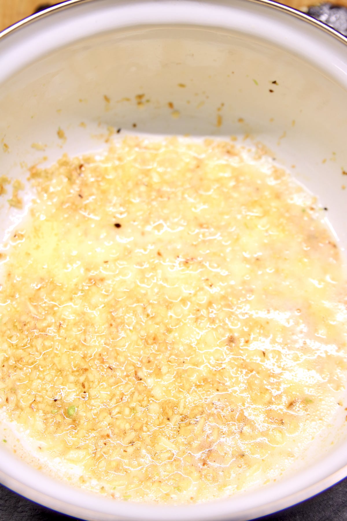 pan with melted butter and garlic.