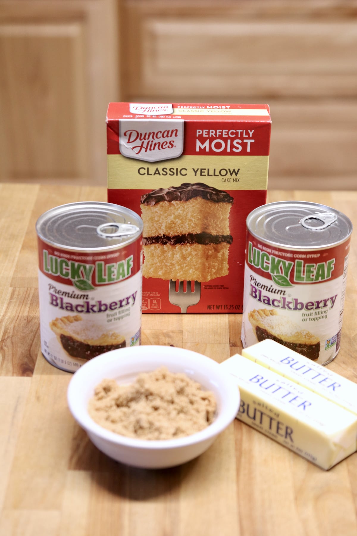 cake mix, 2 cans blackberry pie filling, butter, brown sugar.