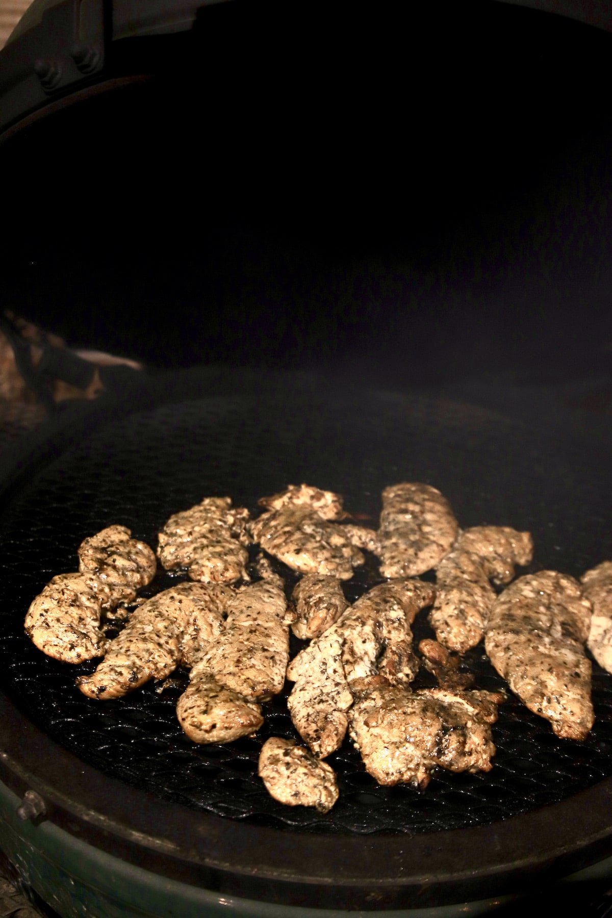 Grilling chicken tenders. 