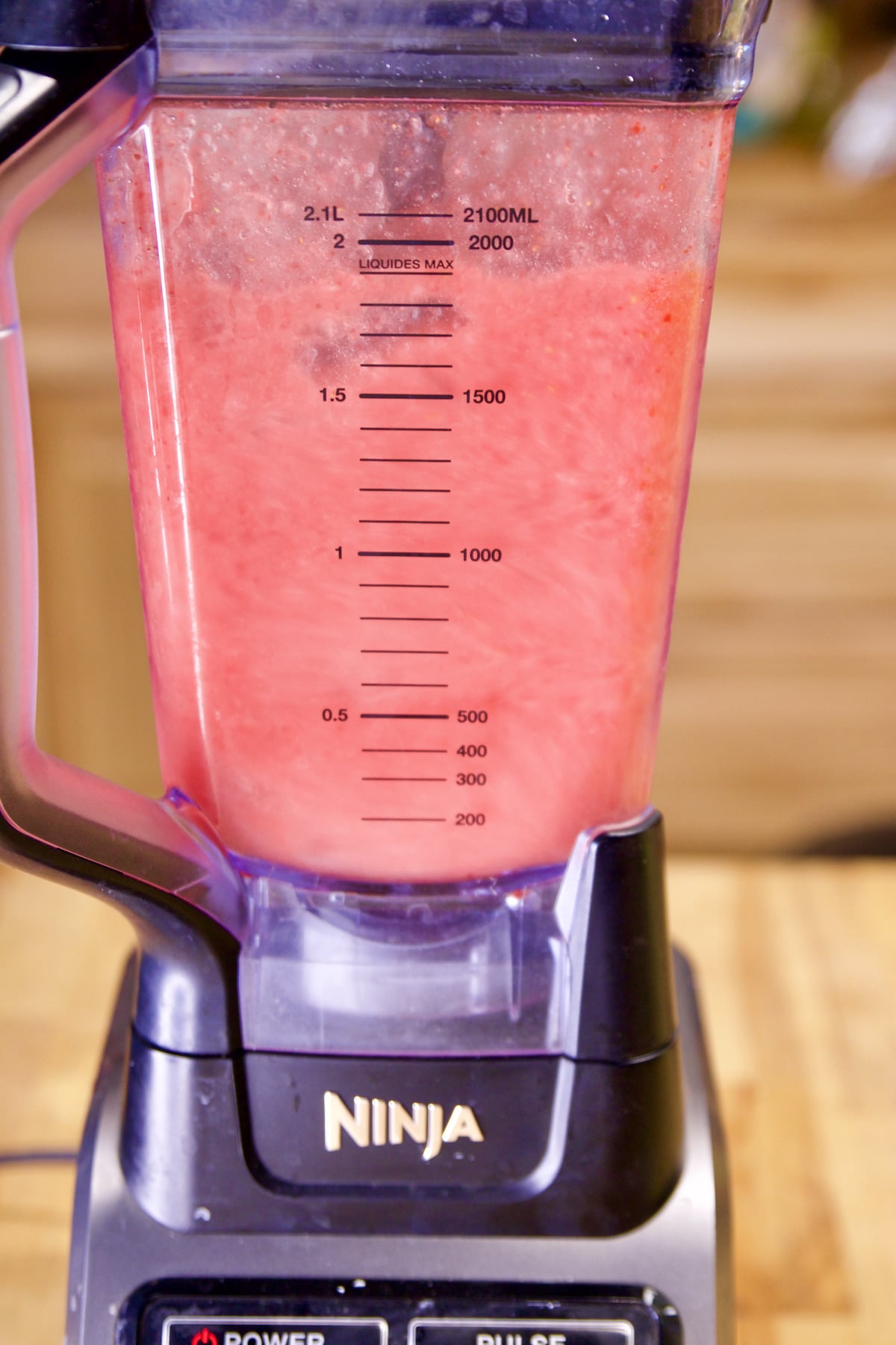 Blender with strawberry margaritas.