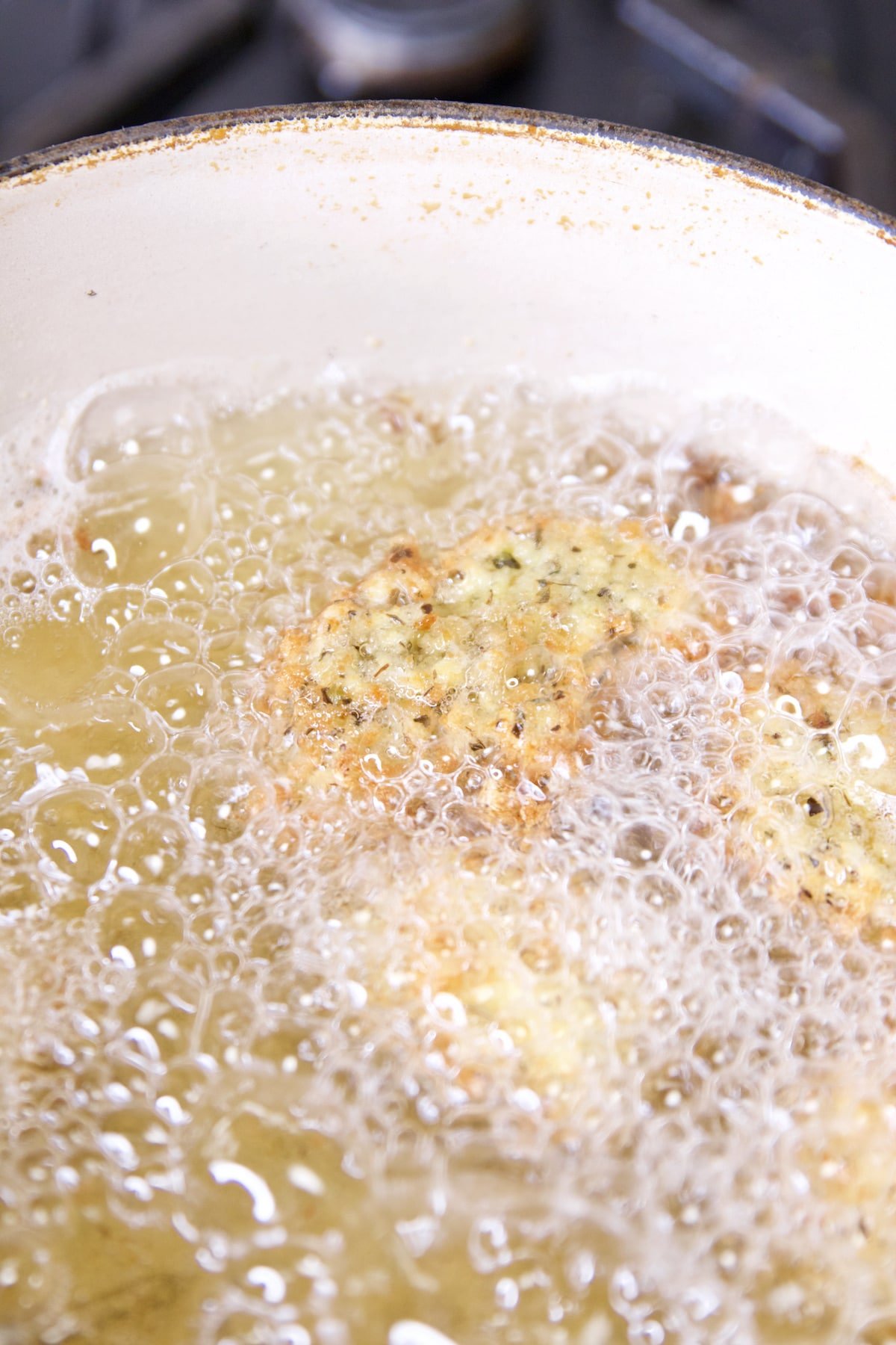 Deep frying cheese curds.