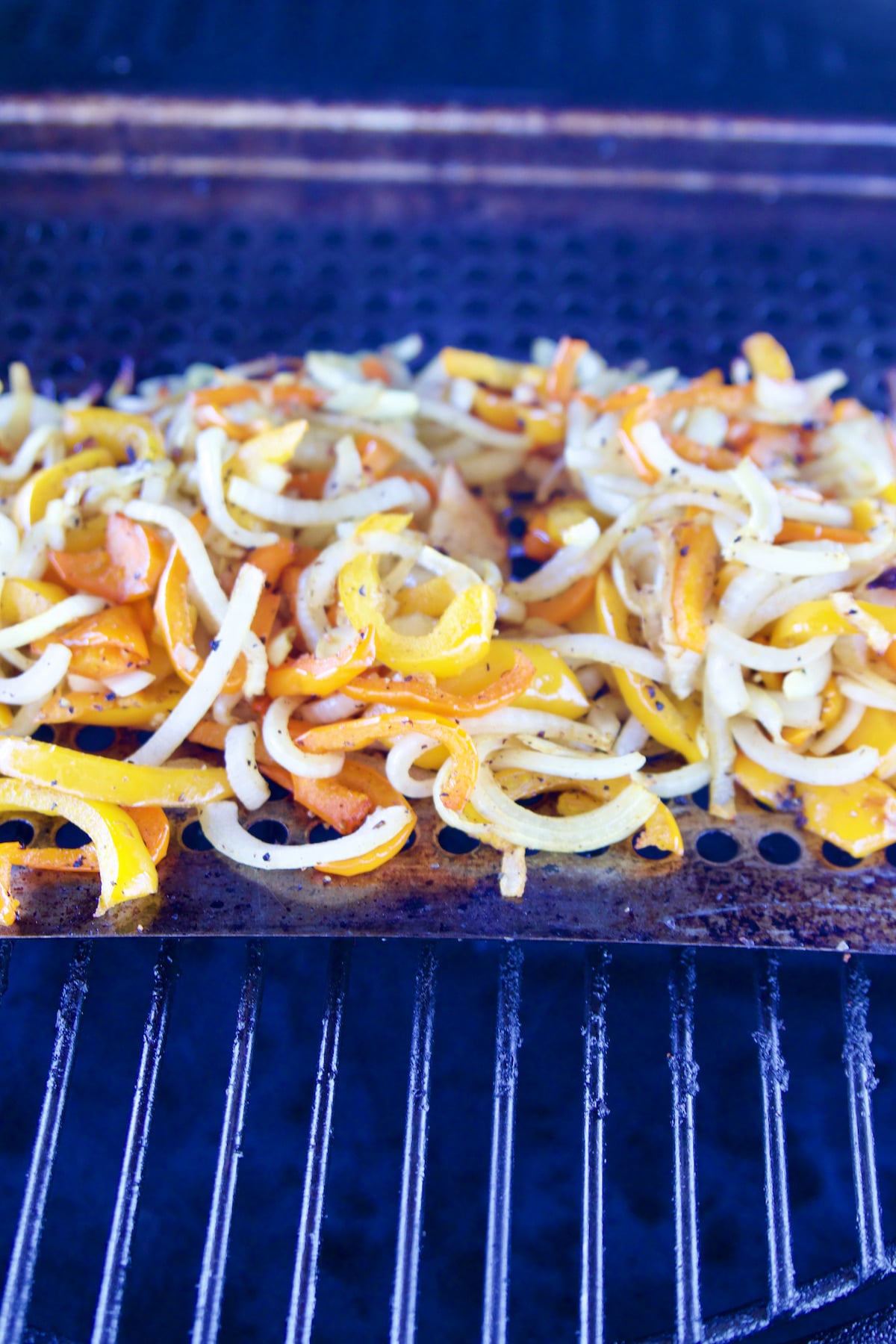 Grilling peppers and onions.