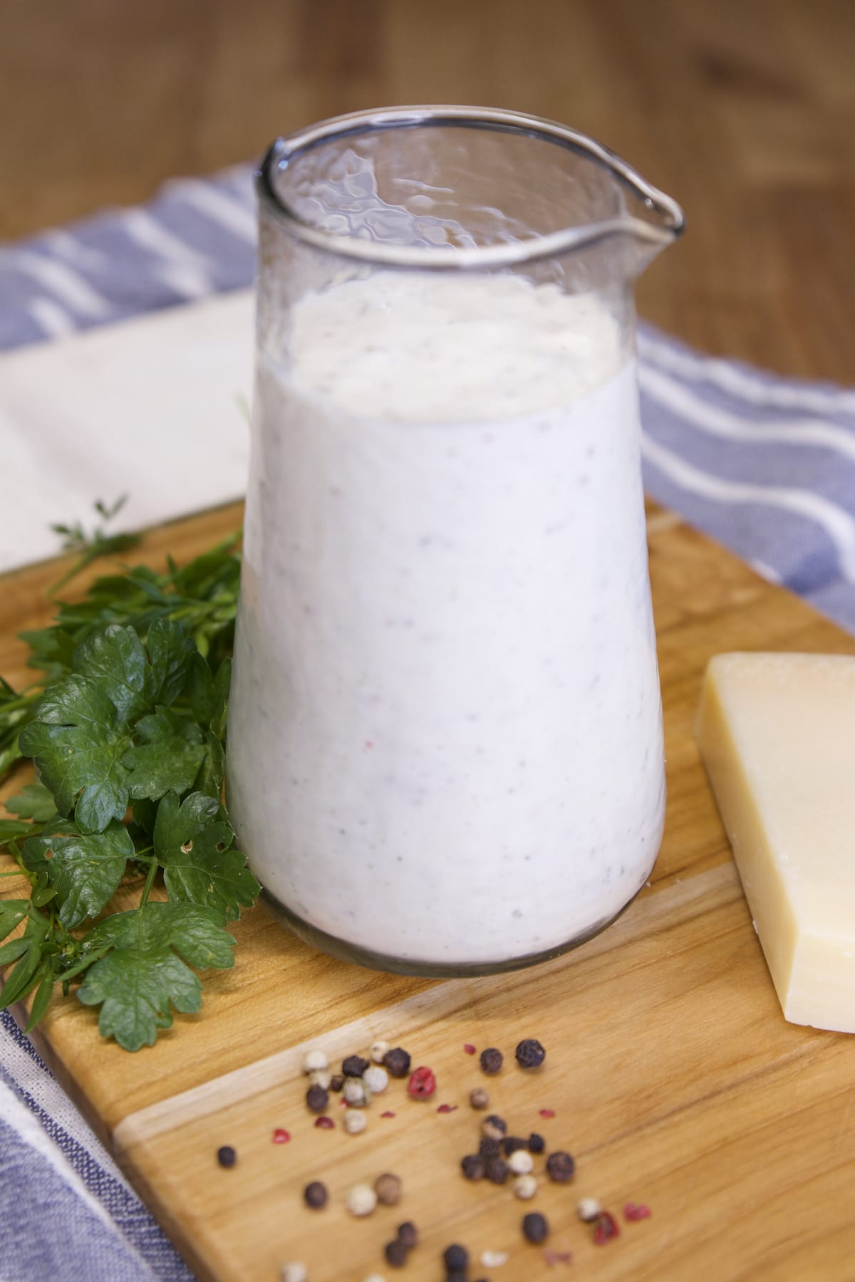 Parmesan Ranch Dressing in a glass dressing jar.