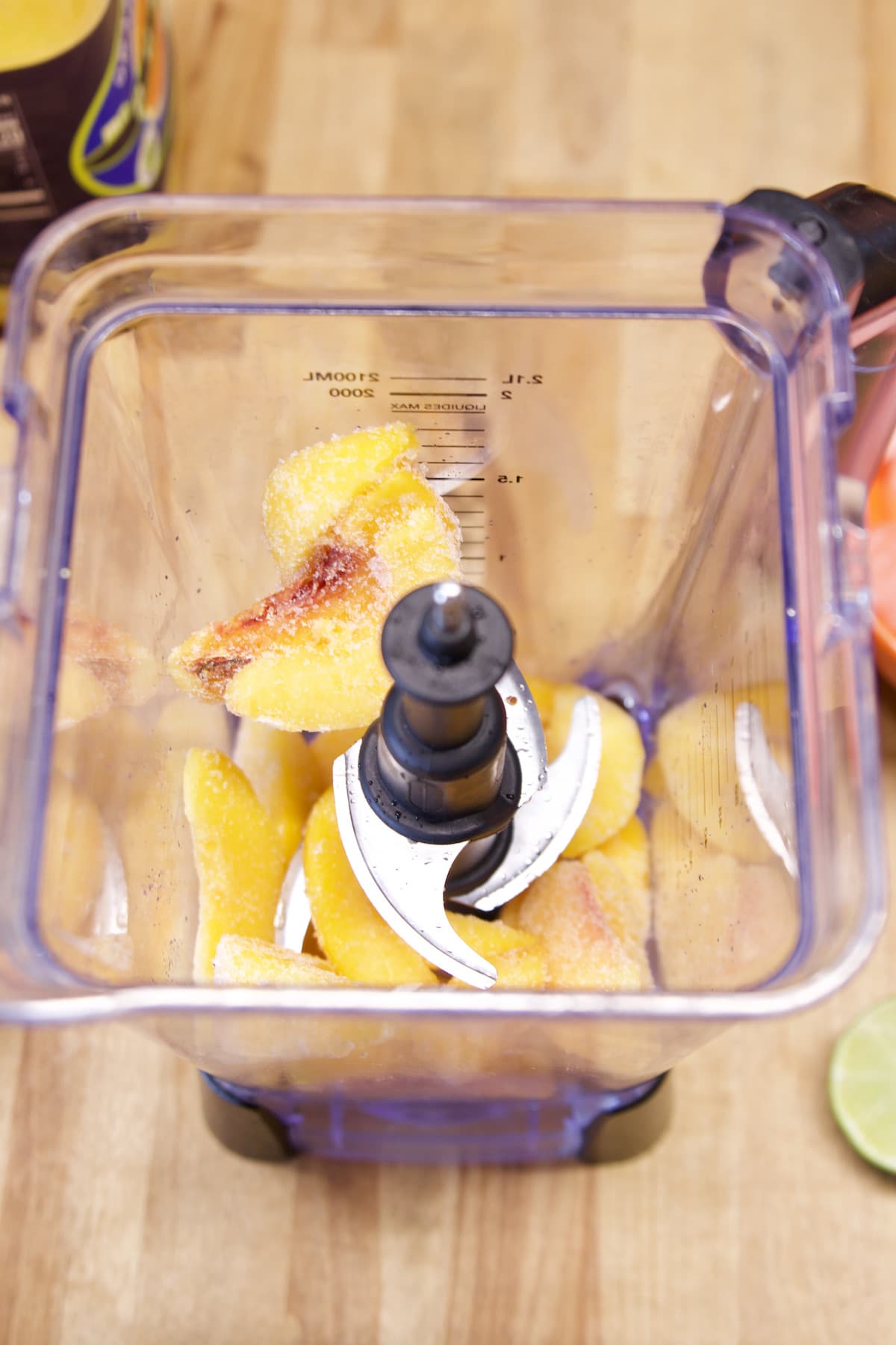Frozen peaches in a blender.