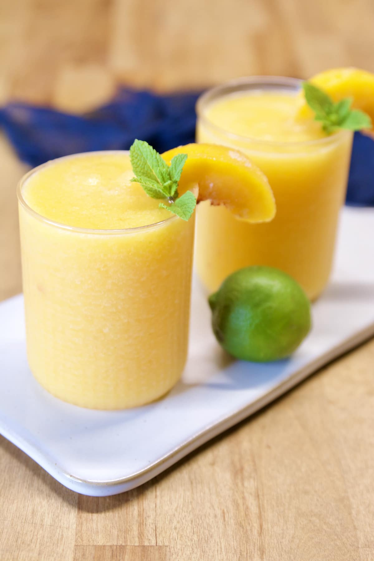 2 glasses of peach daquiris.