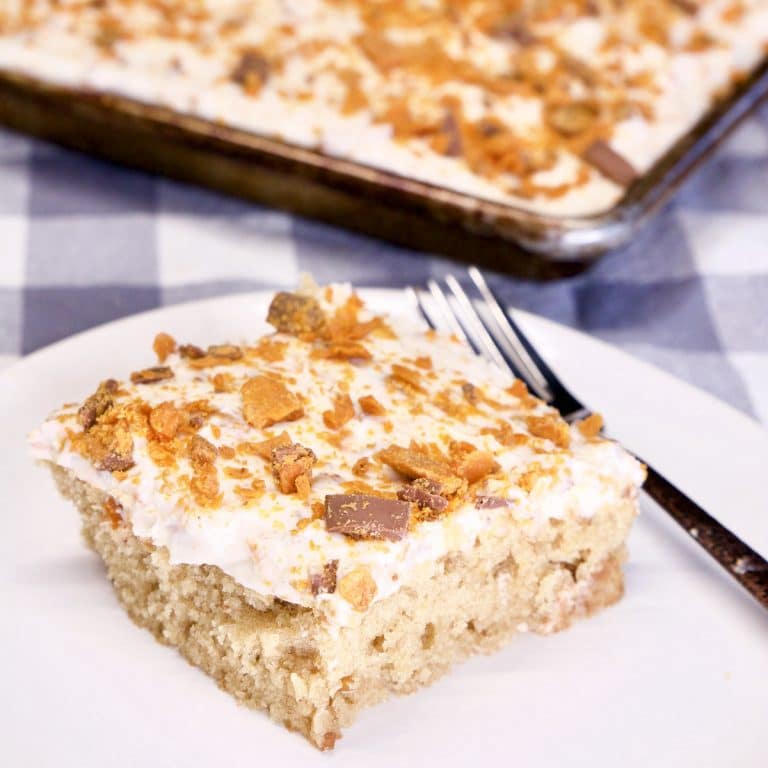 Slice of Peanut Butter Cake with Butterfinger Icing.