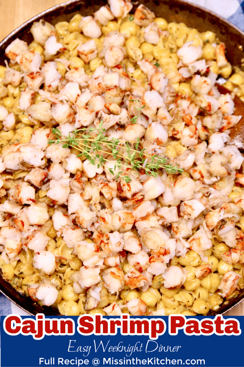 Cajun Shrimp Pasta in a skillet. Text overlay.
