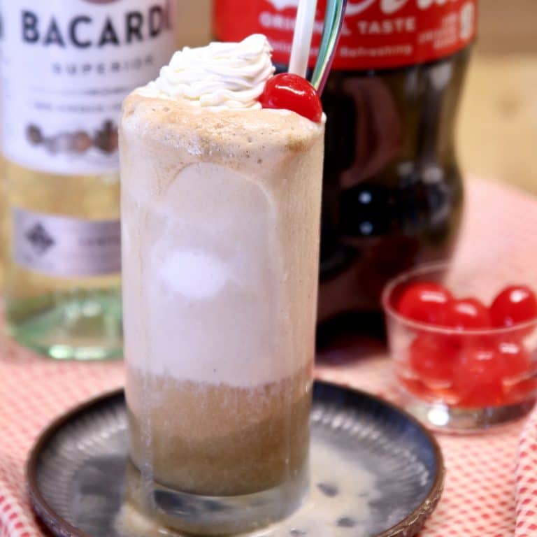 Rum and Coke Float with bottle of rum & bottle of coke.