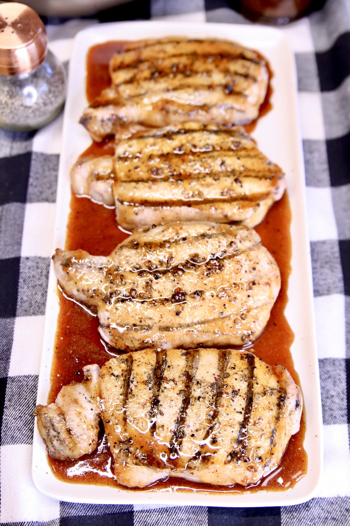 4 Grilled Pork Chops with honey garlic sauce.
