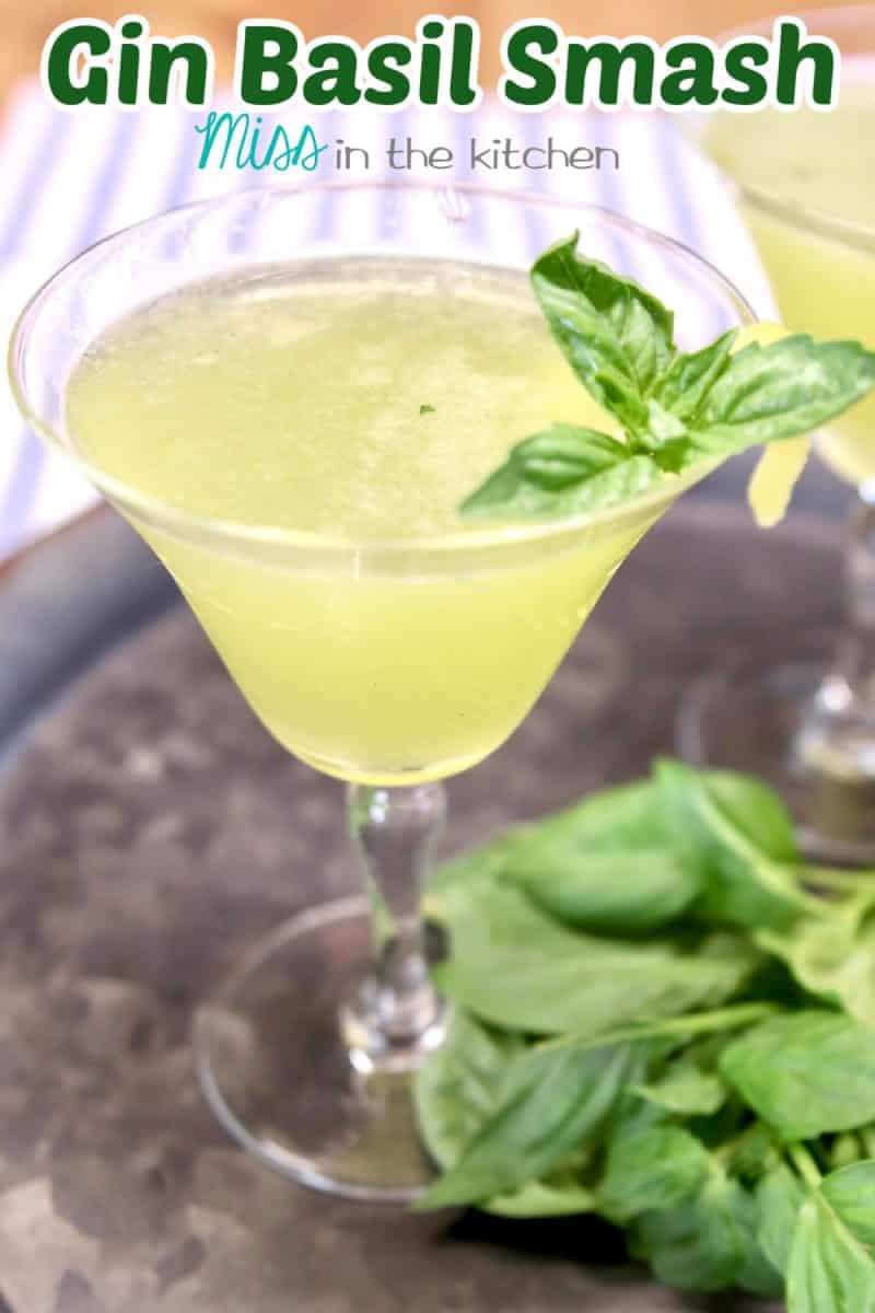 Gin Basil Smash in a coupe glass - text overlay.