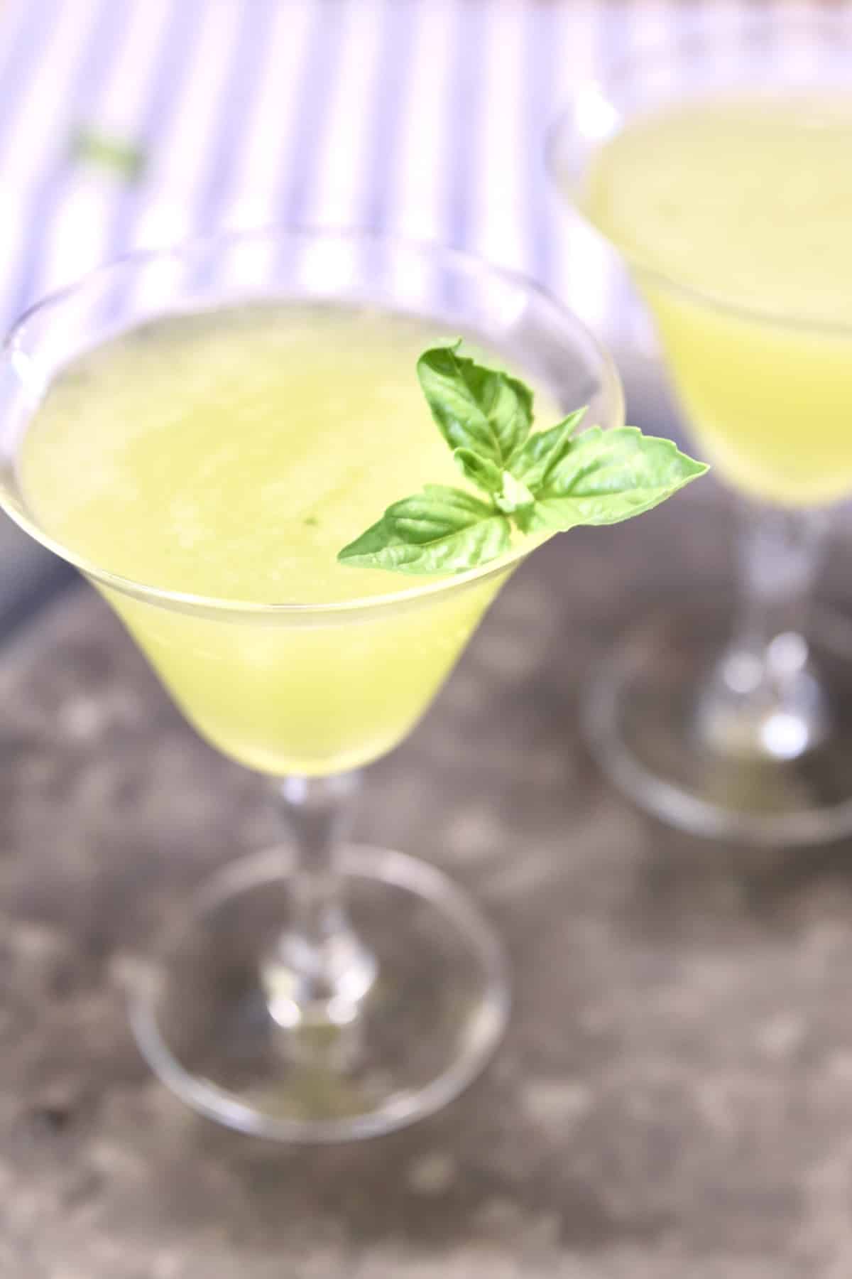 Gin Basil Smash Cocktail on a tray.