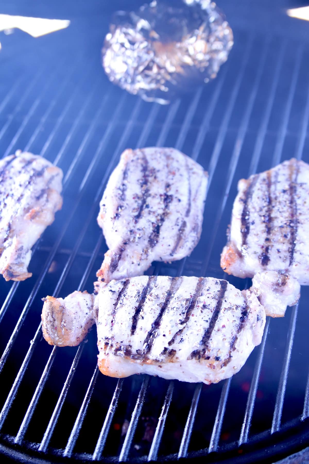 Grilling pork chops.