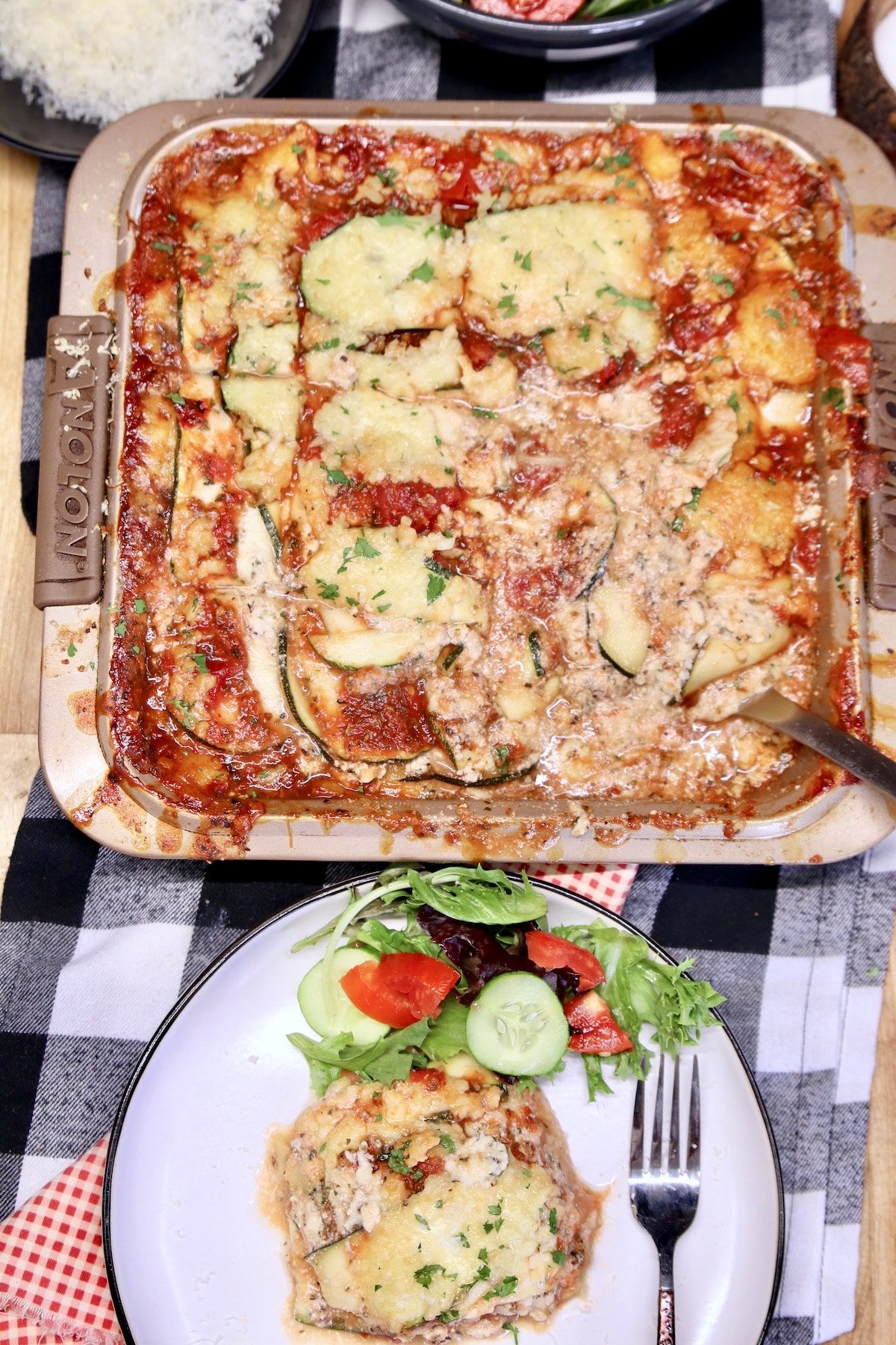 Pan and plated zucchini lasagna.
