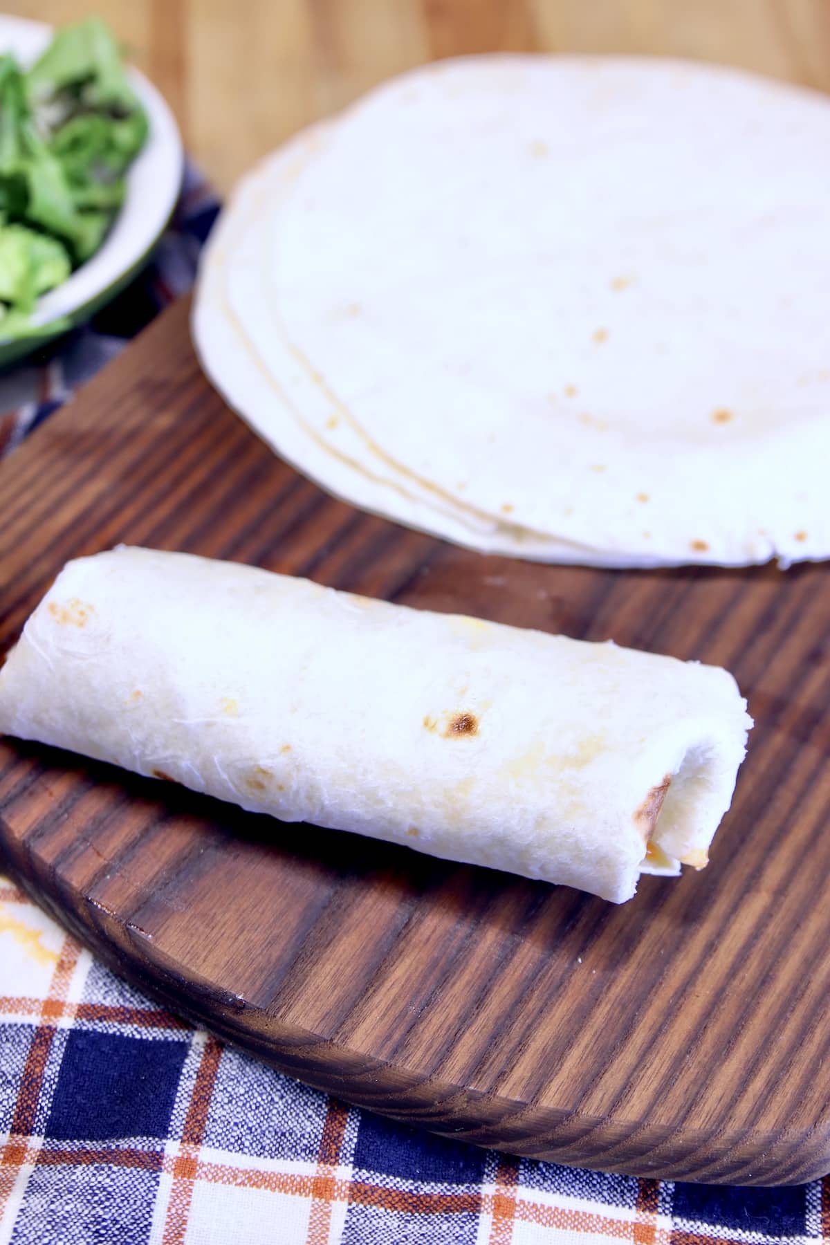 Chicken wrap in flour tortilla.
