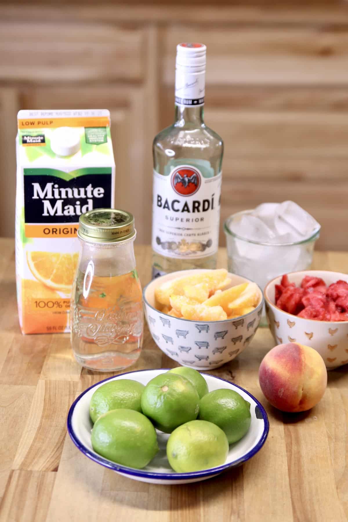 Ingredients for strawberry peach daiquiris.