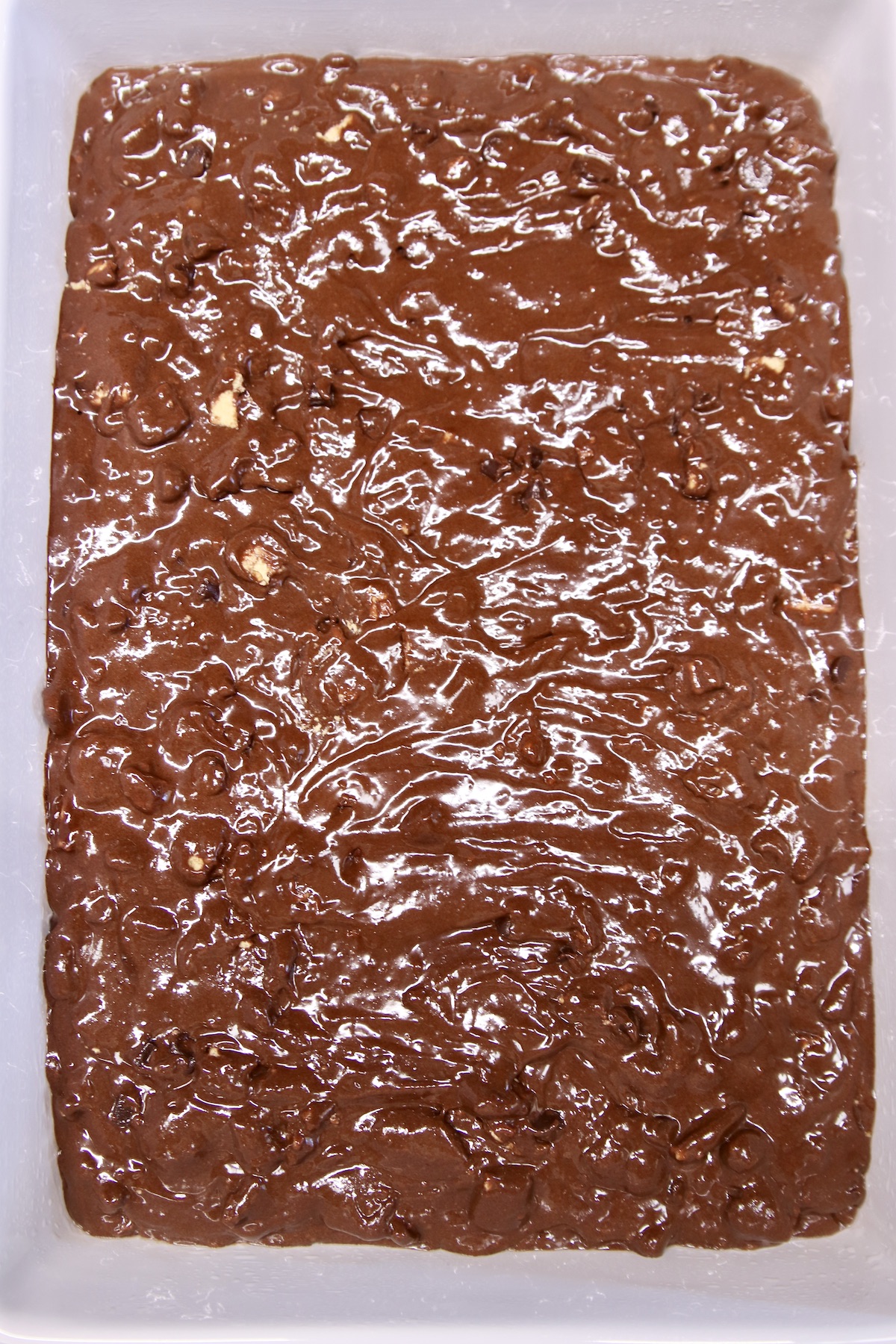Brownie batter in a pan.