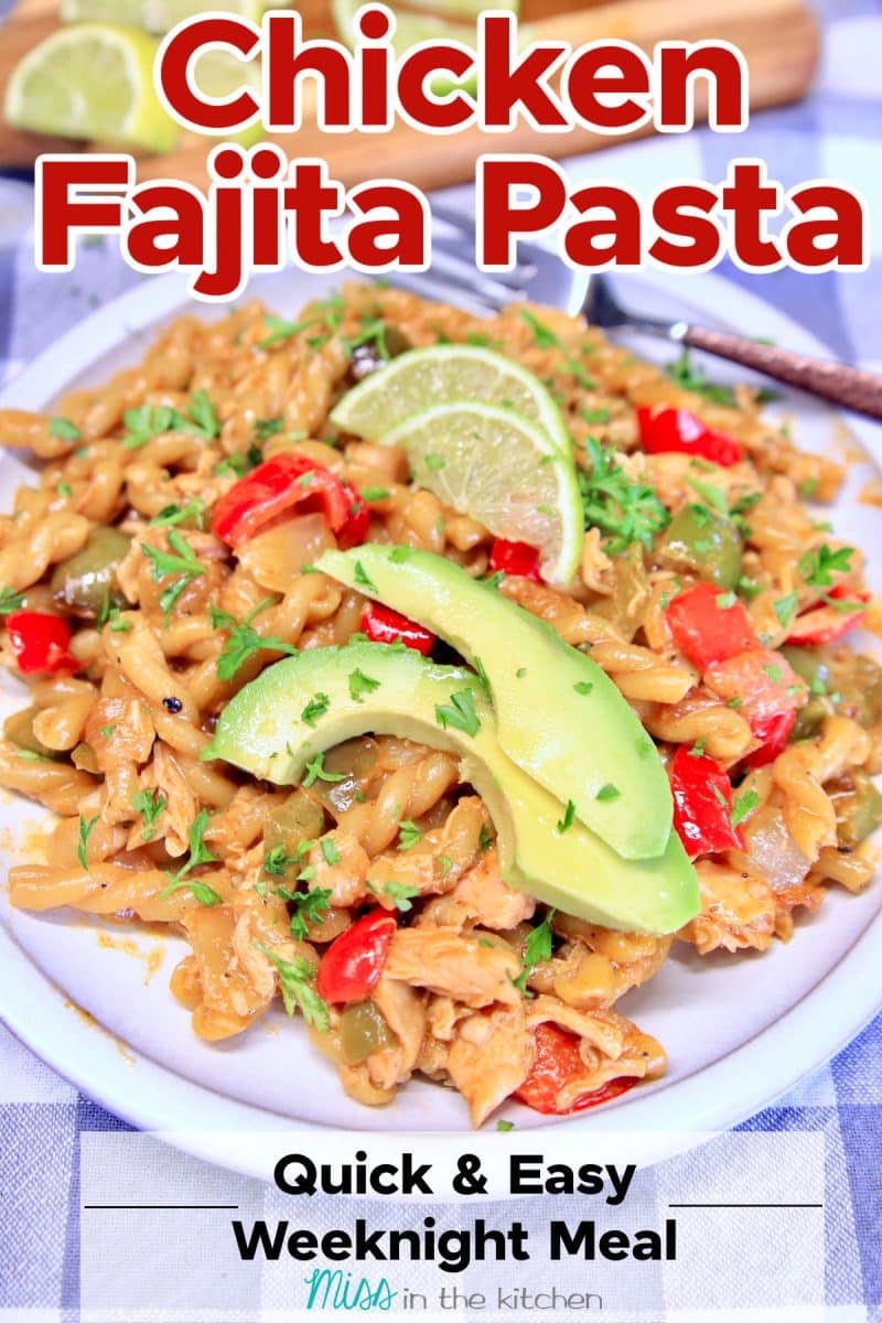Chicken Fajita Pasta on a plate with sliced avocado.