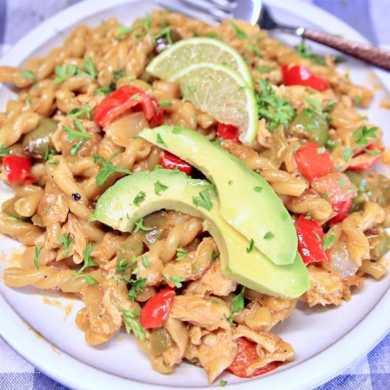 Chicken Fajita Pasta with sliced avocado.