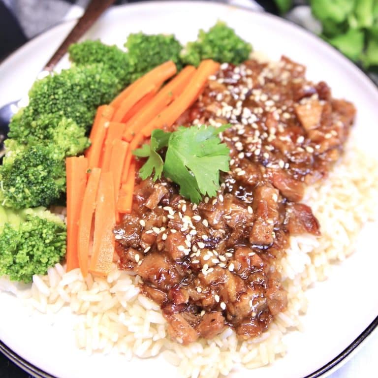 Mongolian Pork with broccoli and carrots over rice.
