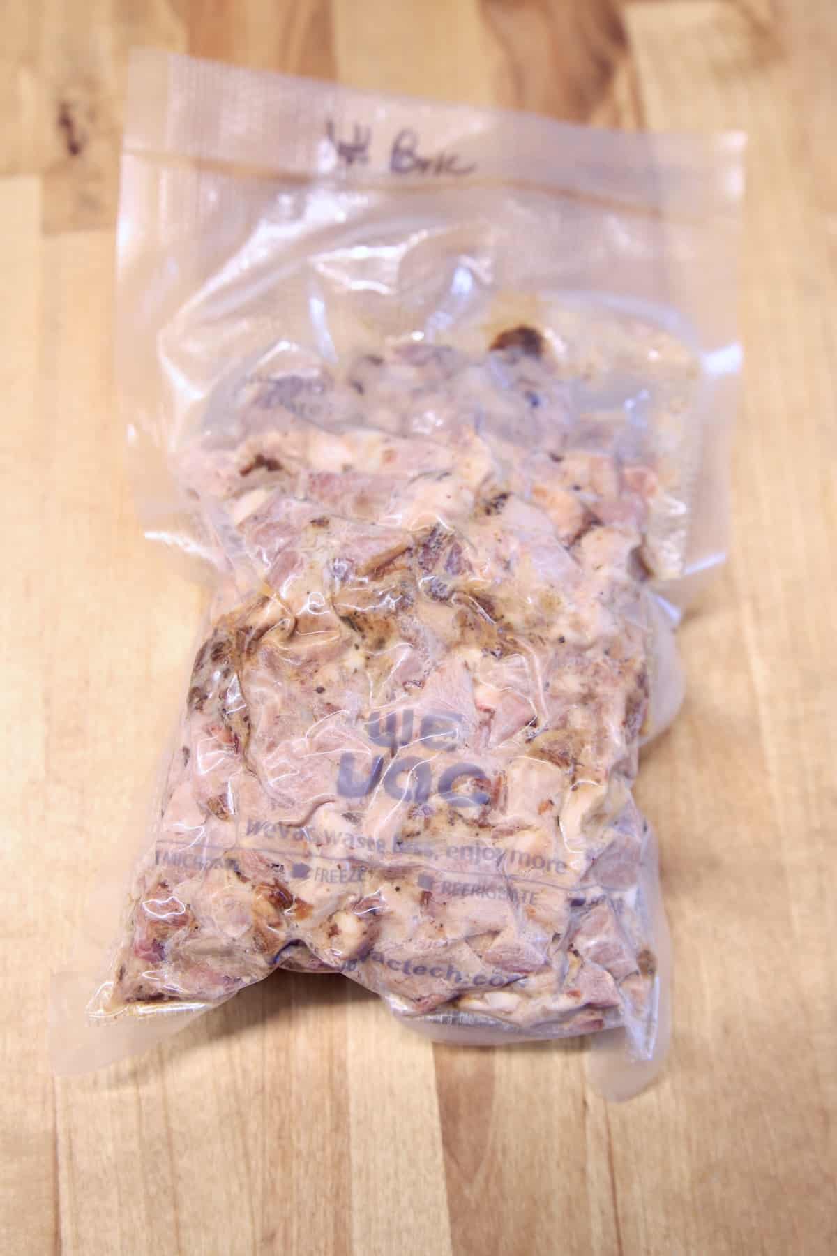 Smoked pork in vacuum sealed bag.