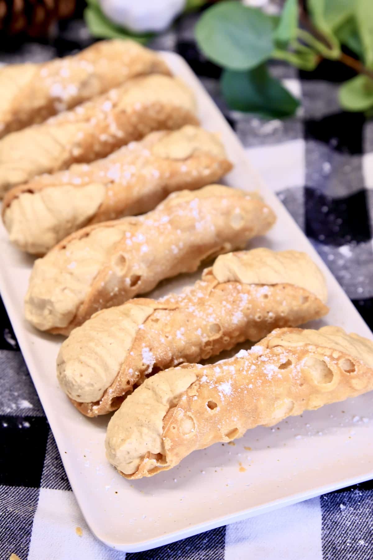 Pumpkin cannoli on a platter.