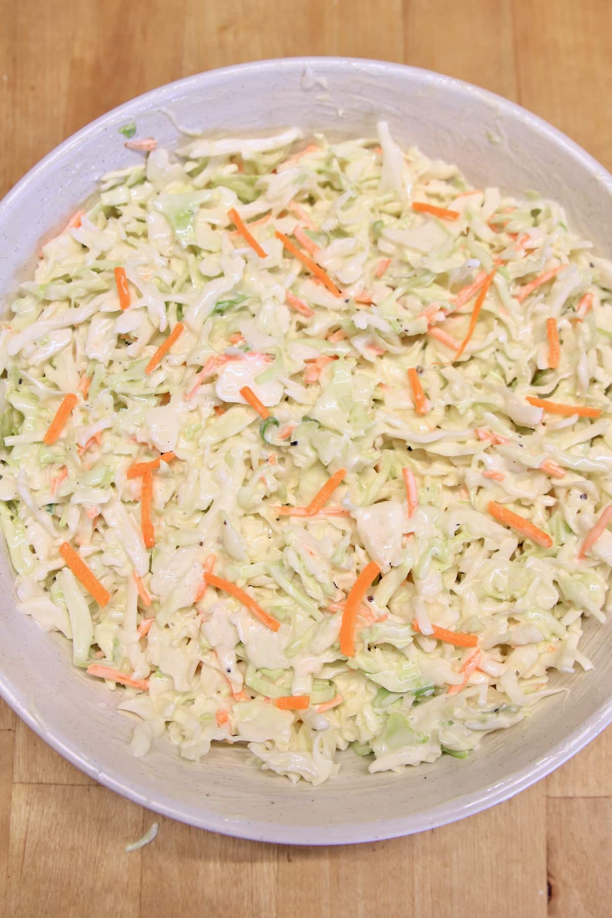 Bowl of creamy coleslaw.