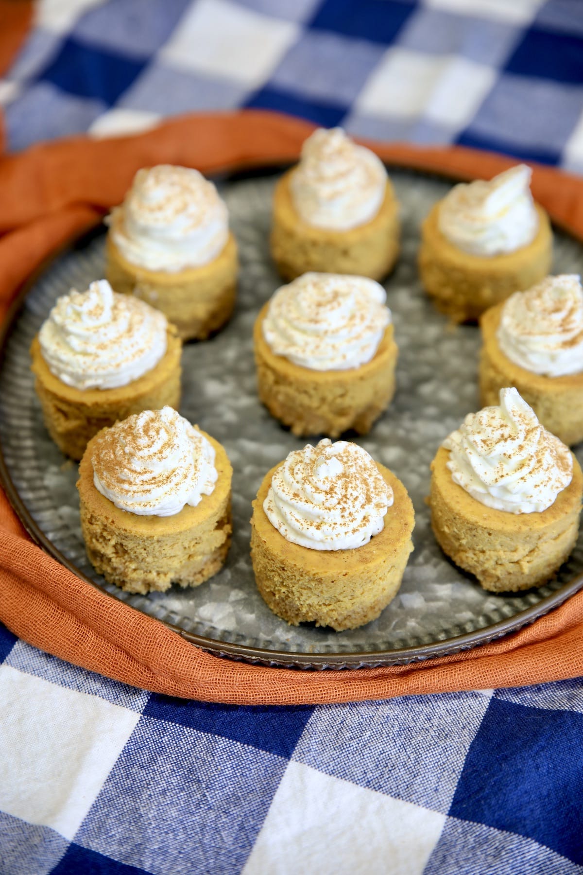 Tray of mini pumpkin cheesecakes.