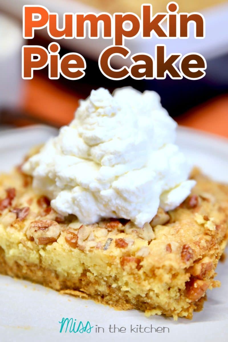 Pumpkin Pie Cake slice on a plate with whipped cream. Text overlay.