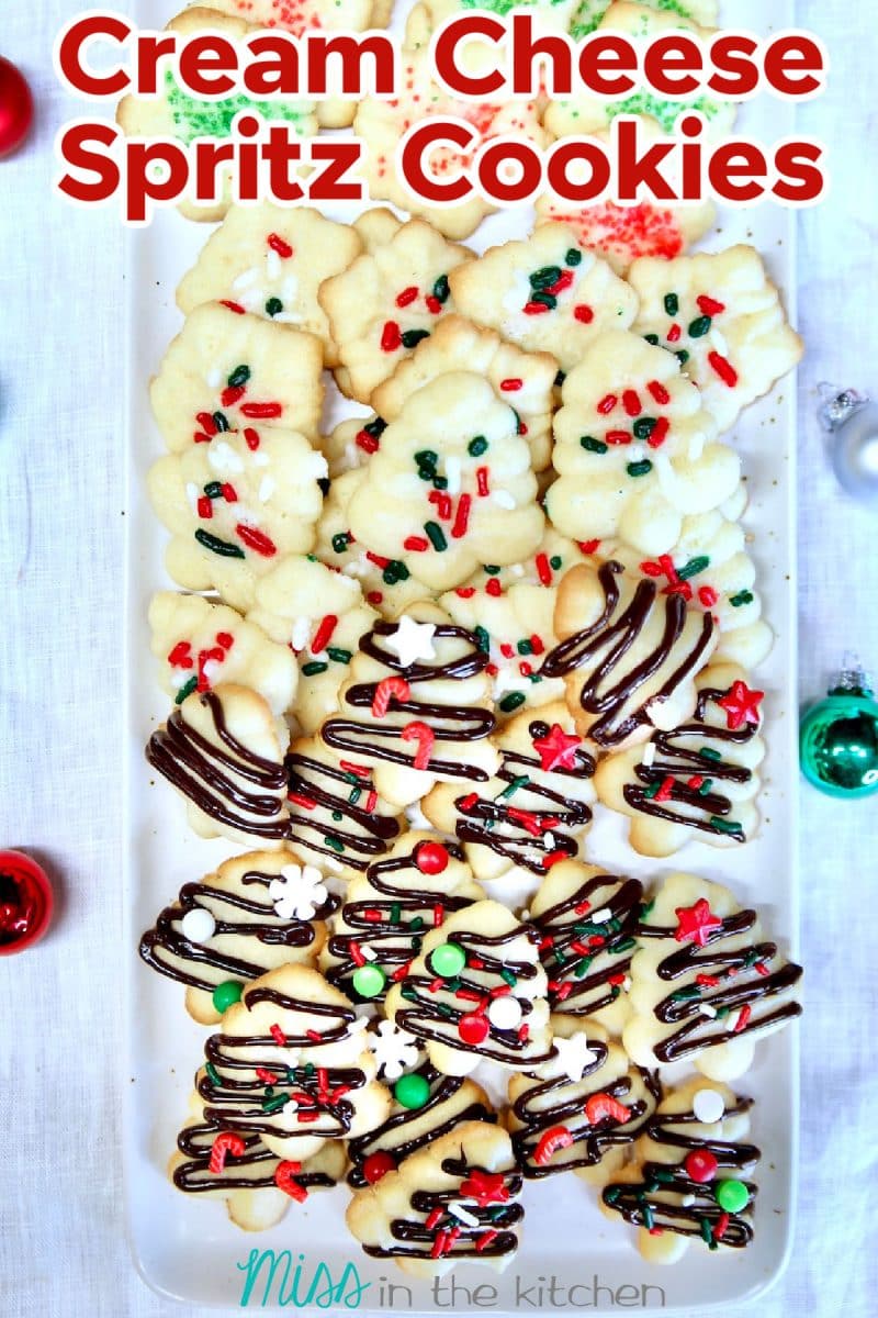 Cream Cheese Spritz Cookies on a tray. Text overlay.