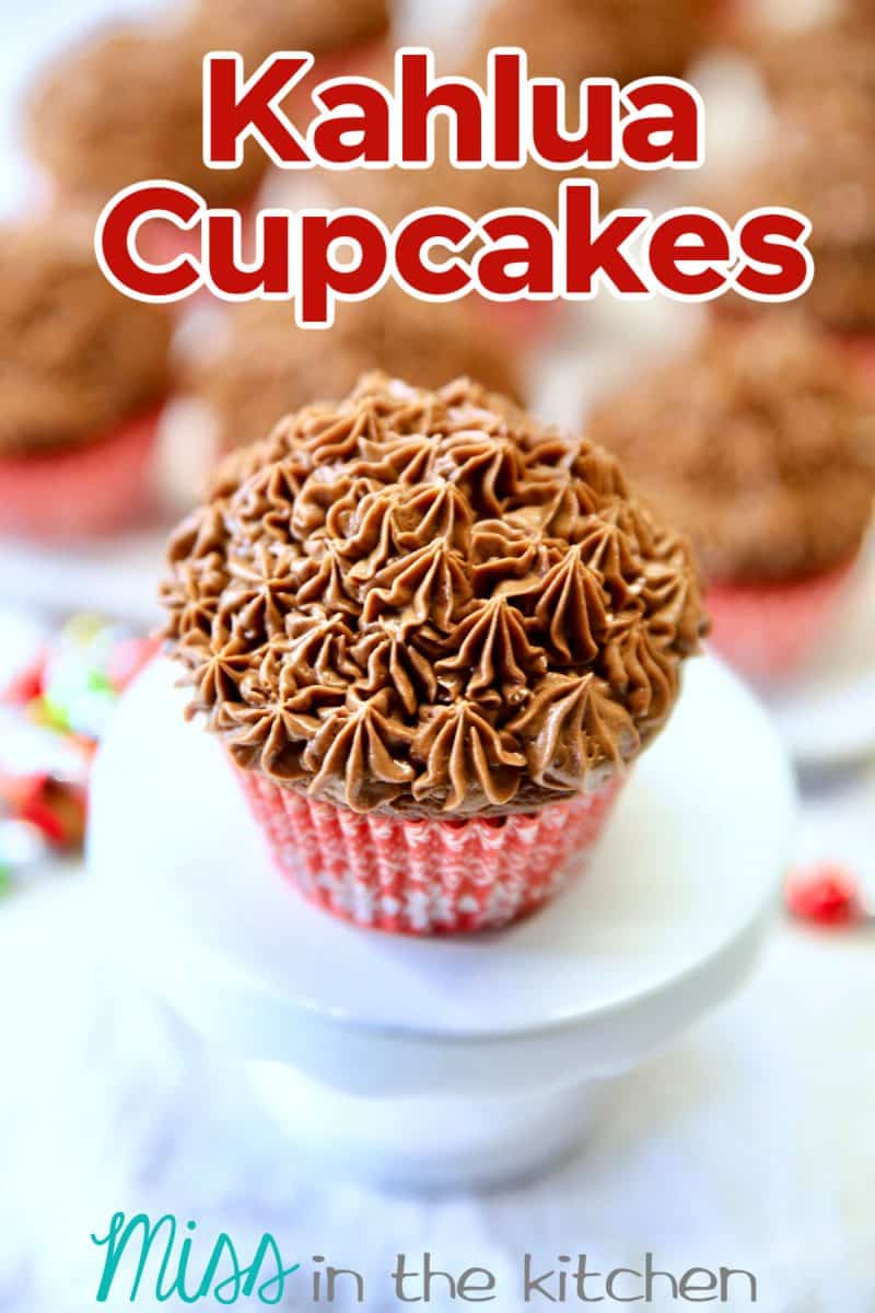 Closeup of chocolate cupcake on a pedestal. Text overlay.