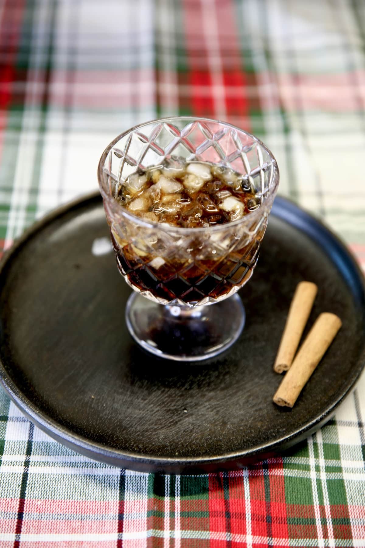 Glass with Kahlua, vodka and ice.