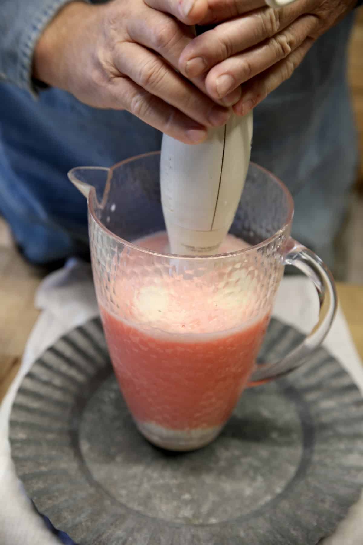 Blending sherbet punch.