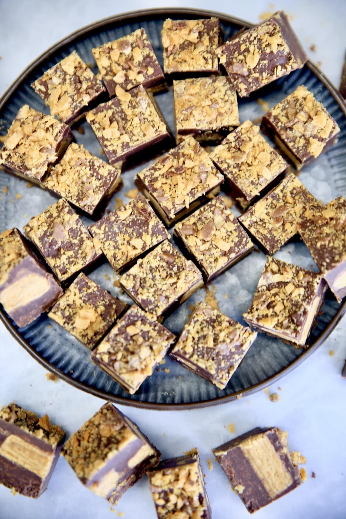 Overhead view of platter of Butterfinger Fudge chunks.