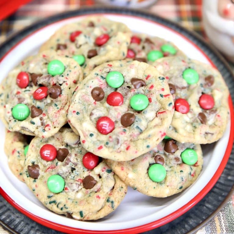Plate of chocolate chip sprinkle cookies with M&Ms.