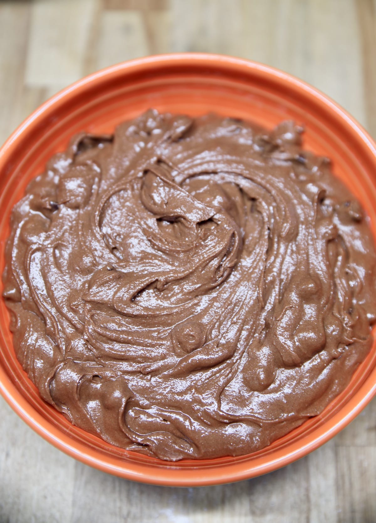 Chocolate cookie dough in a bowl.