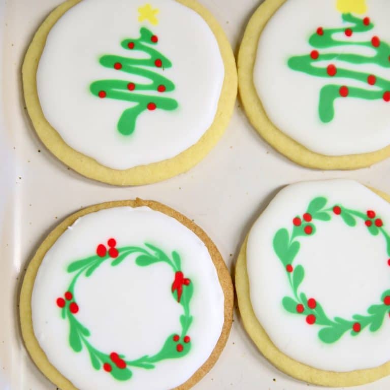 Iced sugar cookies decorated for Christmas.