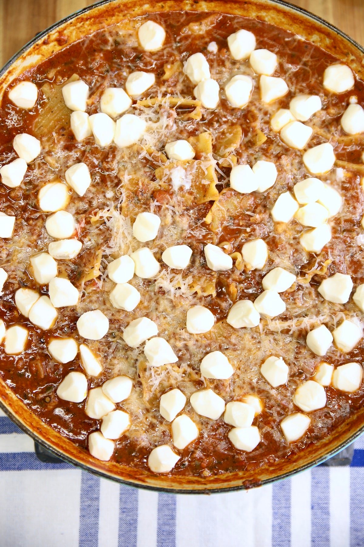 Mozzarella balls and parmesan in lasagna soup.