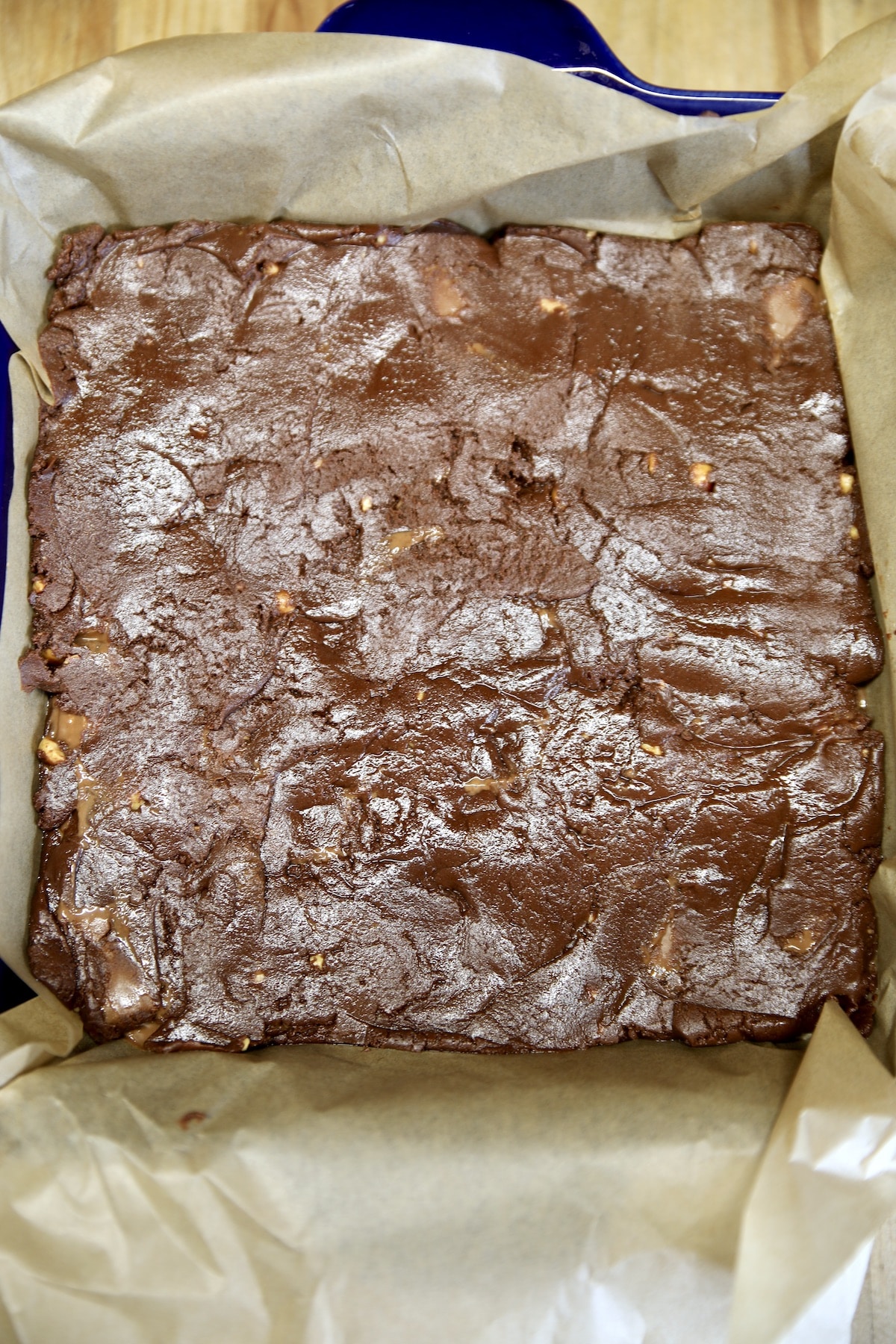 Chocolate peanut butter fudge in a pan.